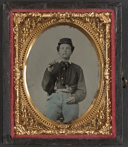 [Unidentified soldier in Union uniform with two revolvers and picking his teeth with a Bowie knife]  (LOC) | by The Library of Congress