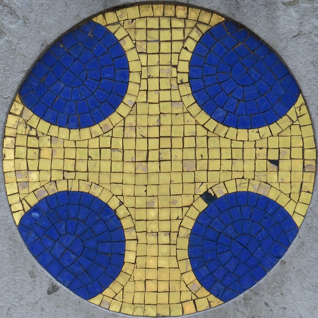 Gold tiled cross on blue