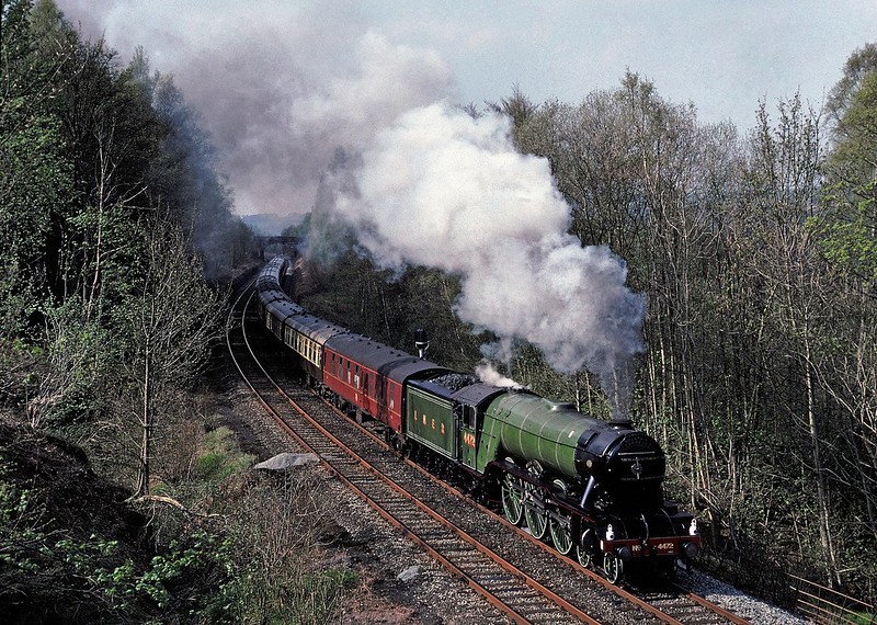 4472 Flying Scotsman passes the site of the current landslip at Eden Brows with a southbound Cumbrian Mountain Express on April 27th 1991.There may well have been some problems then as some trees had been felled near where I stood which opened up the shot.
Picture used in Heritage Railway issue 222
Copyright David Price
No unauthorised use please