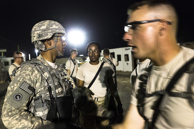 Soldiers from  U.S. Army Central Command Warrior Leadership Course conduct their final training lanes and evaluations with squads of soldiers versus mock opposing forces across multiple lanes during the early morning of July 11, 2014 in Camp Buehring, Kuw