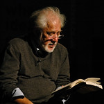Michael Ondaatje reading on stage | 