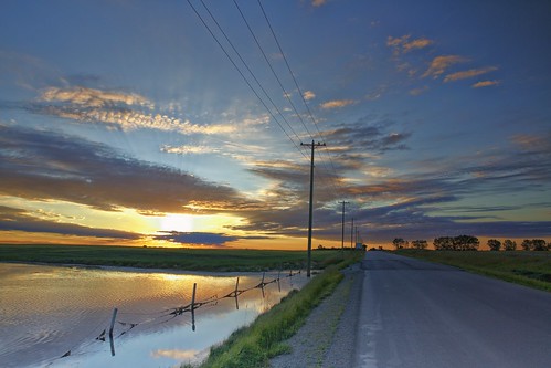 road calgary sunrise fence reflections pond prairie countryroad cloudsstormssunsetssunrises