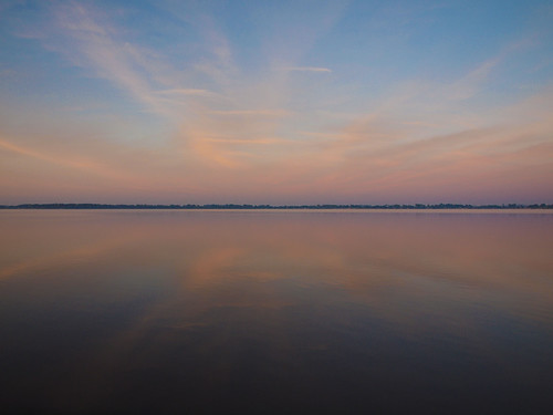 Cotton Candy by tracymckibben, Wispy pink and purple clouds at sunrise reflected on Storm Lake, Iowalake reflection water clouds su