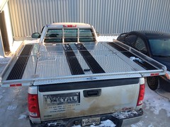 Custom Aluminum Truck Bed Cover Used as Snowmobile Deck