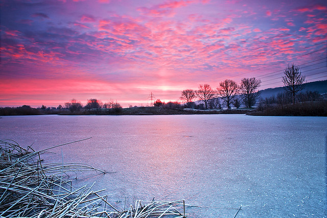 Sunrise over a frozen Lake