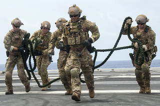 Sailors fast-rope onto the USS George Washington during an… | Flickr