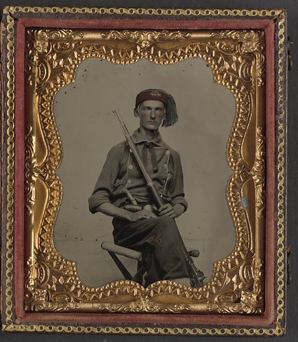 [Unidentified soldier in Union uniform and fez with Model 1855 rifle musket and pepperbox revolver]  (LOC) | by The Library of Congress