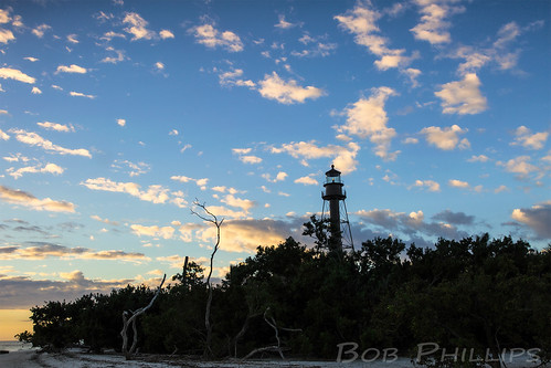 Sanibel Lighthouse by tropicdiver, lighthouse beach gulfofmexico clouds sunrise palmtrees sanibelisland