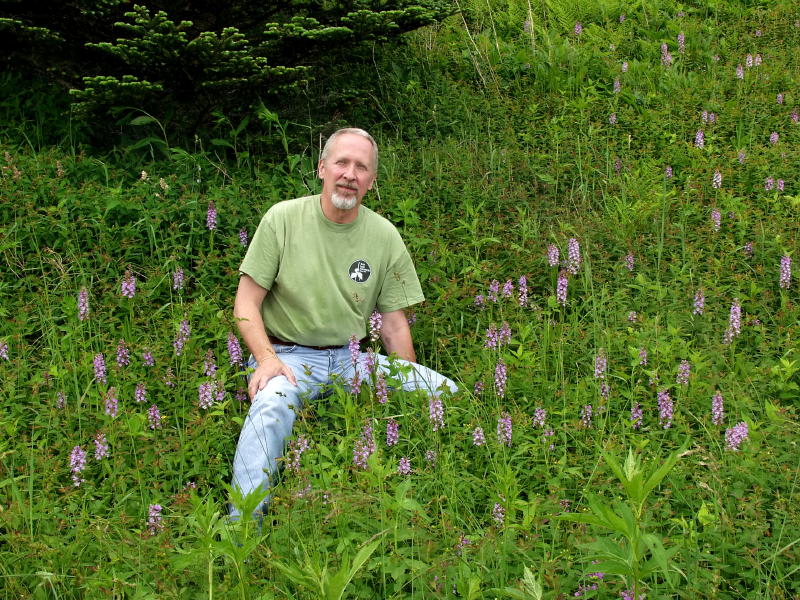 Jim and Platanthera psycodes orchids at Mt. Mitchell State Park, North Carolina