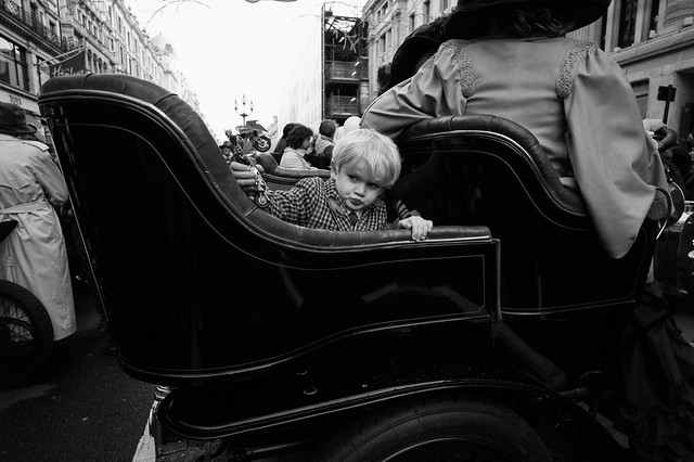 Boy playing intently, The Regent Street Motor Show 2013