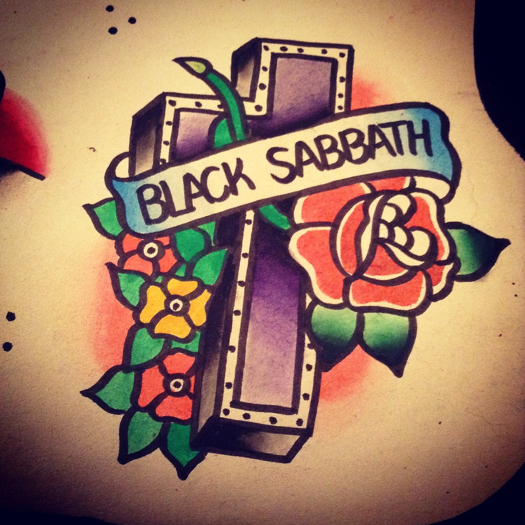 Black sabbath cross tattoo.