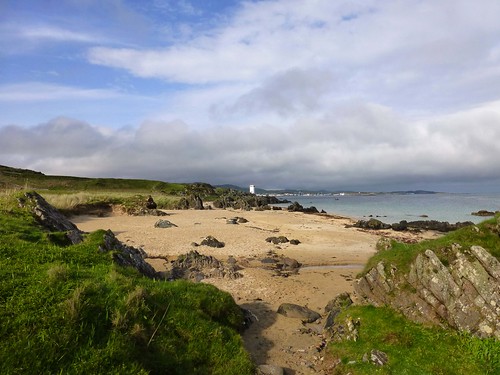 sea lighthouse beach clouds scotland sand rocks portellen singingsands isleofislay argyllandbute worldtrekker