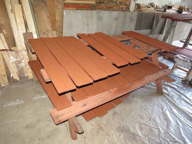 Three layers of stained boards drying
