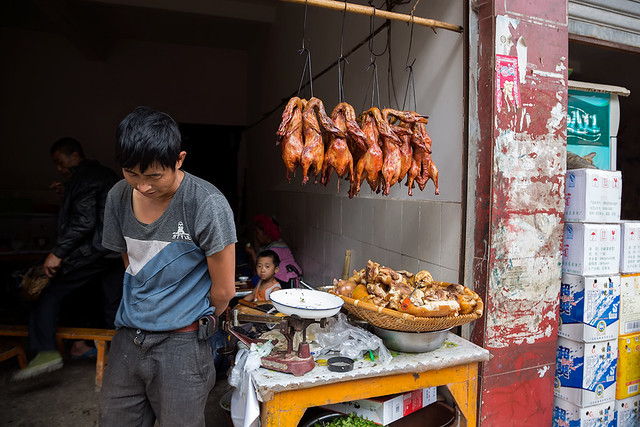 Fried ducks at a market in Xinjie, Yunnan, China.