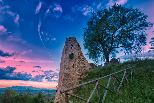 pink sunset building tree green tower castle abandoned grass landscape twilight ancient ruins view dominate outdoor hill violet historical setting umbria ruined giano morchicchia