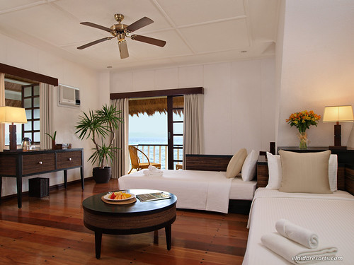 Apulit Island -  Loft Water Cottage Living Room Area