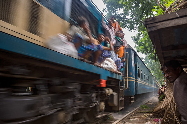A train passes a shanty town in Dhaka, Bangladesh.