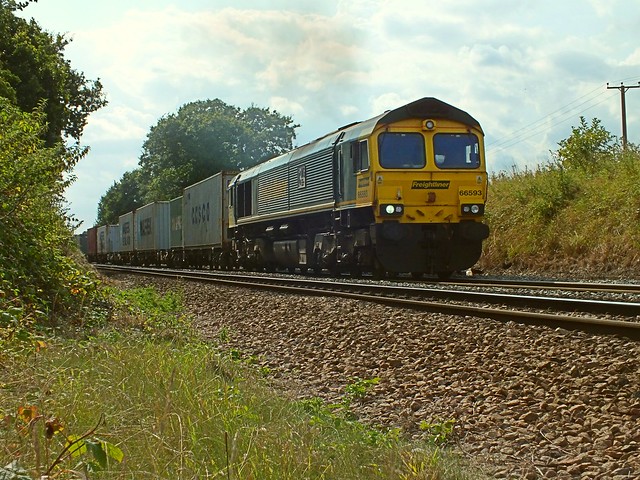 66593 approaching Westerfield Station, with the Lawley Street - Felistowe Freightliner. 06 08 2014