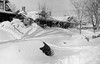 View of automobiles, houses and yards, buried in snow drifts, after the 1982 snowstorm, 2377 Elm Street in the South Park Hill neighborhood of Denver Colorado. (Denver Public Library Digital Collection)