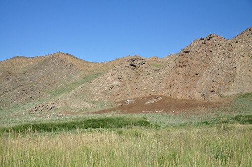 mountains water mining pollution land dust profit nomads ironore resettlement herders