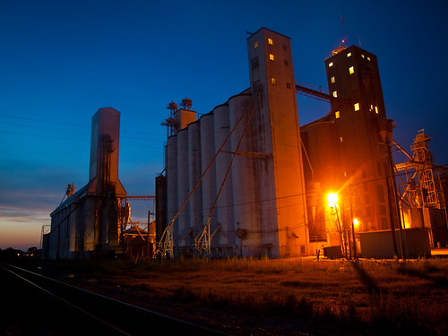 Delta by cormack13, Sunset by a rice elevator, near Dumas, Arkansas. This wasn't the wisest place to take pictures. I