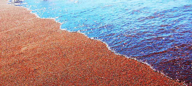 red sand, red beach