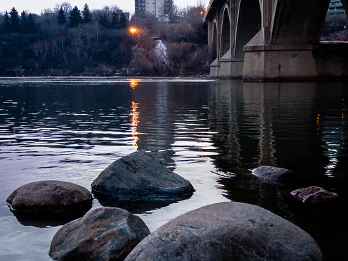 bridge river rocks sunrise water saskatoon saskatchewan canada ca