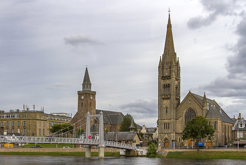 footbridge over river ness inverness scottish highlands suspension bridge crosses linking huntly street west bank east spires various churches including old high st stephens church free marys catholic tourist attractions city andrews cathedral further upriver scotland kev gregory canon 7d