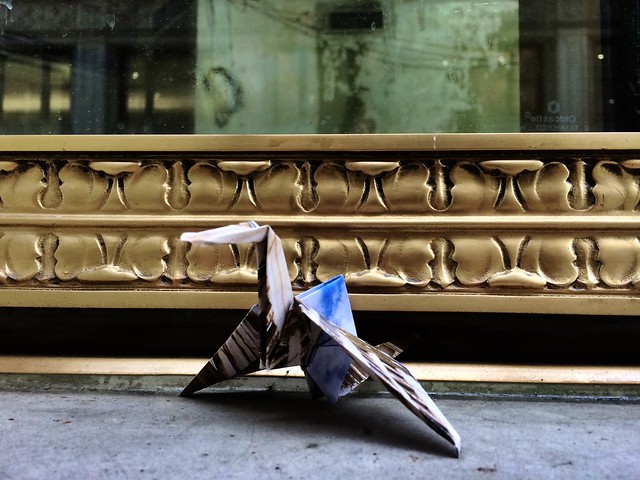Wrigley Building photo folded into an origami crane while standing at the Wrigley Building #foldedphotos #011/1000