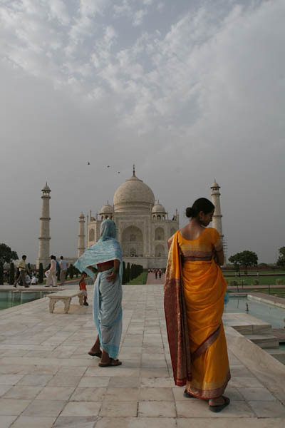 Woman in Saffron Saree at the Taj, India