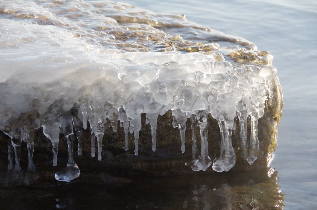 shoreline ice on rock | Sandy Vandervalk | Flickr