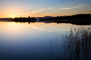 Reflected sunset over Lake of Menteith