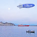 Greece, Macedonιa, Aegean Sea, advertising blimp above Kavala port by Macedonia Travel & News 