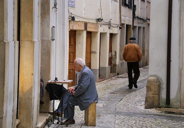 Playing checkers on the street of Coimbra