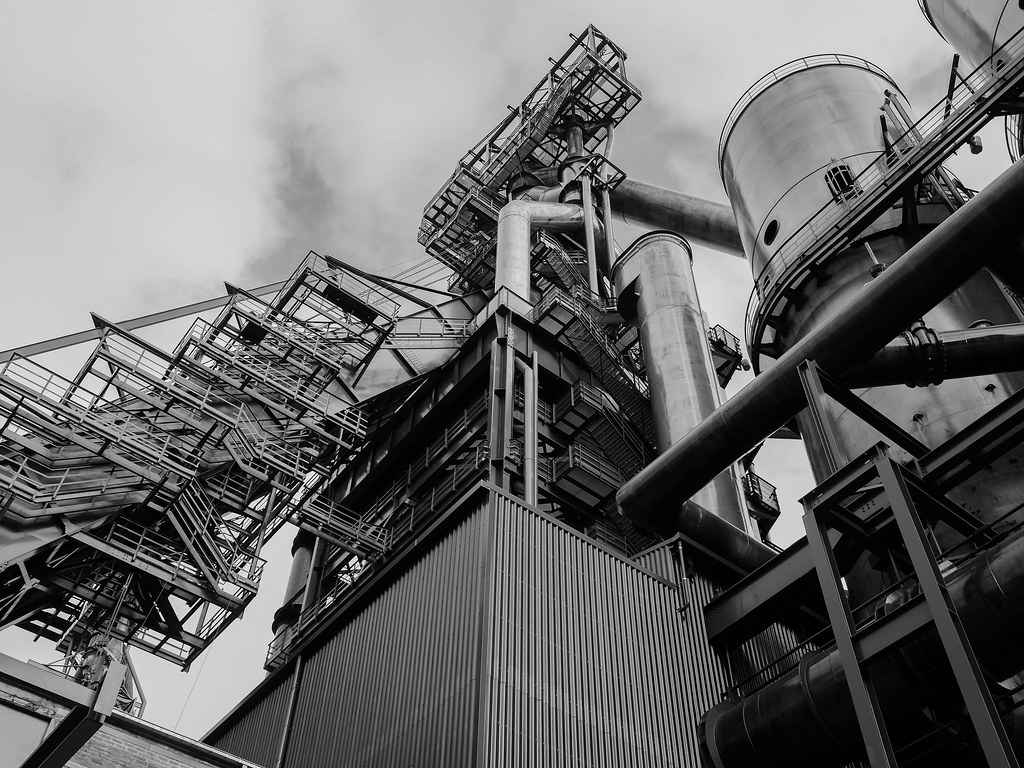 The steel structures of a mill, photographed in black and white