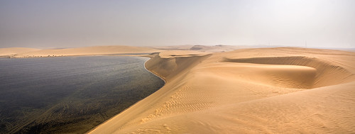 qatar's inland sea amongst the desert's sand dunes by Russell Scott Images,   Khor Al Udeid (The Inland Sea - actually there are a number of them as the incoming tide fills the