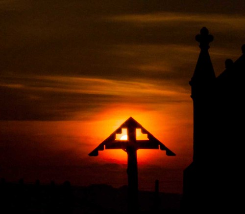 sky orange sun silhouette dawn scotland orkney crucifix holm italianchapel