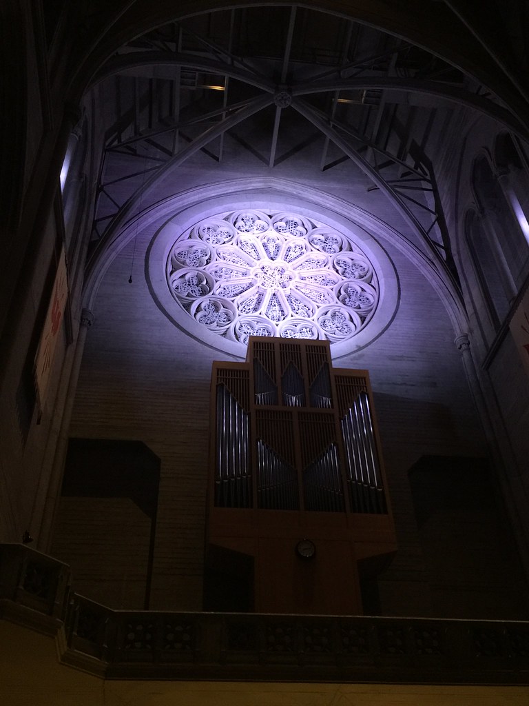 Rose Window inside Grace Cathedral at night