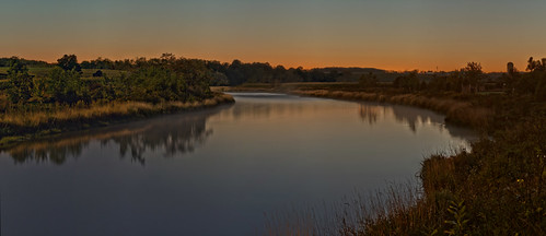 Above the Princess Elizabeth Bridge by virgil martin, The last whisp of sunset fades just as the near-full moon rises to provide most of the light for thi