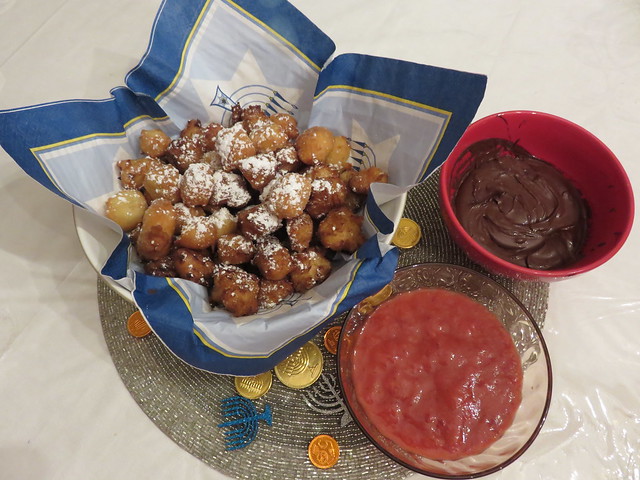 Happy Hanukkah! Fried pâte à choux, pets de nonne, sufganyot, French crullers, with berry and chocolate sauces.