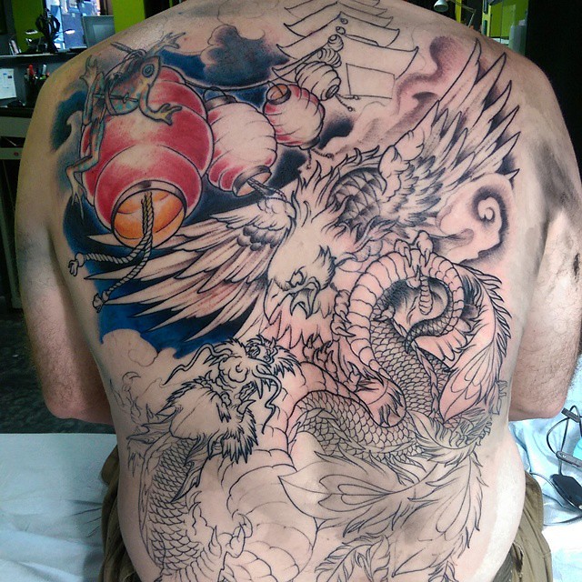 Skull Phoenix Back Tattoo by Shige: TattooNOW