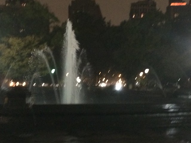 Washington Square Park in Greenwich Village, Manhattan, NYC - at night in the rain