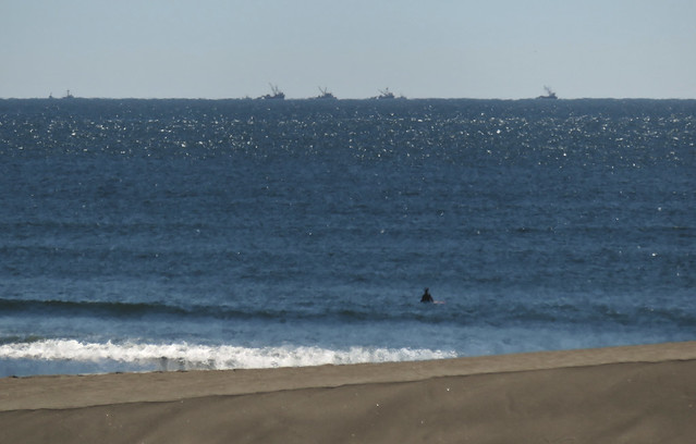 surfer and fishing boats; Ocean Beach, San Francisco (2015)
