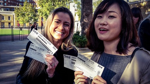Happy students with their fashion tickets