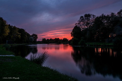 sunset pond lake longexposure water clouds colourful trees fishing