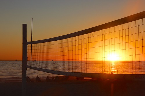 beach volleyball sun sunset net ocean sea california carpinteria ca november sky orange horizon horizontal outdoors ©karolfranks okarolyahoocom karolfranksgmailcom karolfranks