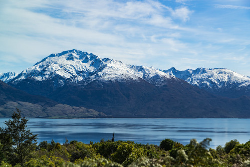 blue newzealand lake snow mountains water landscape still nz southisland lakewanaka mtalbert mtaspiringrange