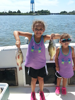 Photo of two girls fishing