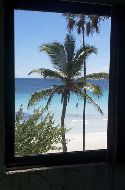 Tulum beach, Yucatan, and Caribbean, with girl, seen from cabana window