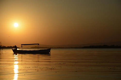 sunset dawn boat fishing